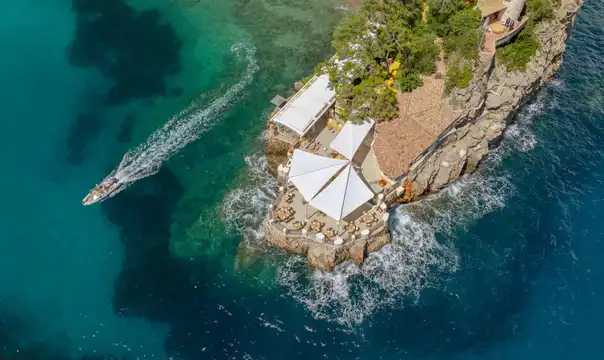 Aerial view of La Vigie on Monaco's rocky coastline