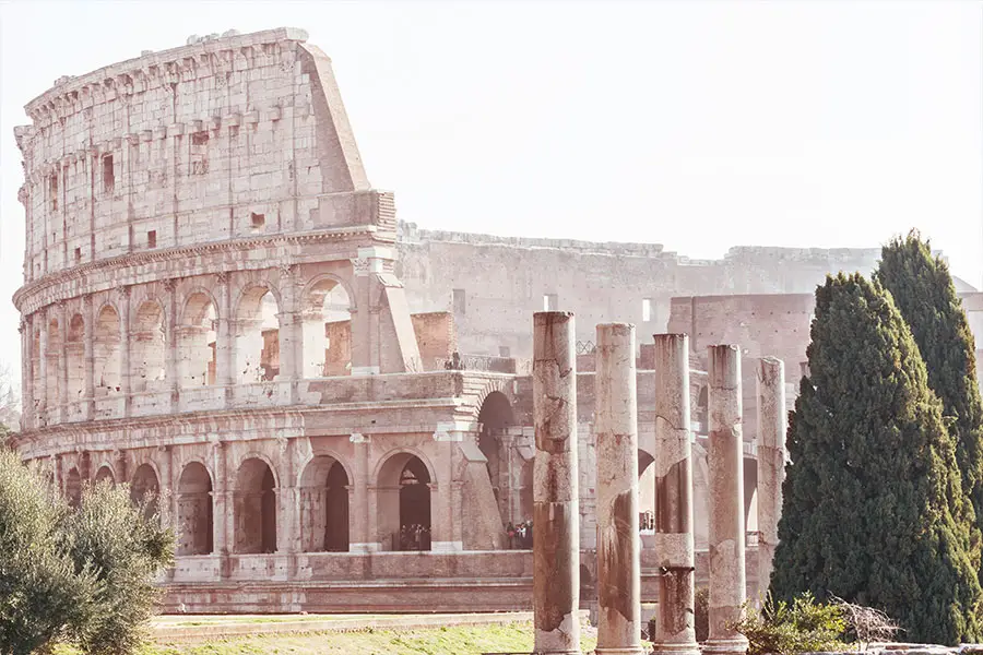 The Colosseum and surrounding ruins in daylight