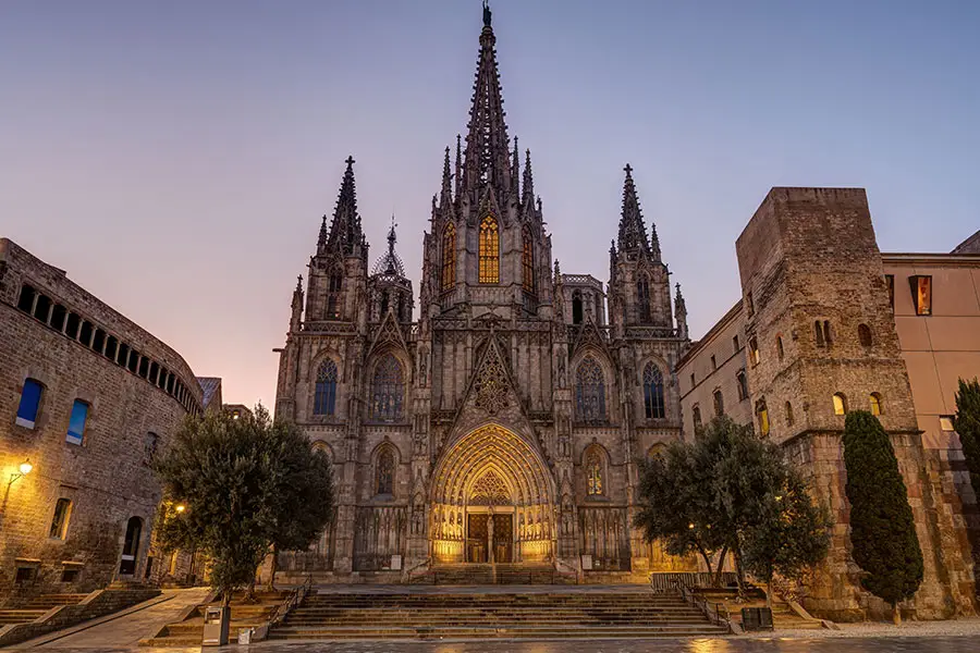 Barcelona Cathedral and its square at dusk