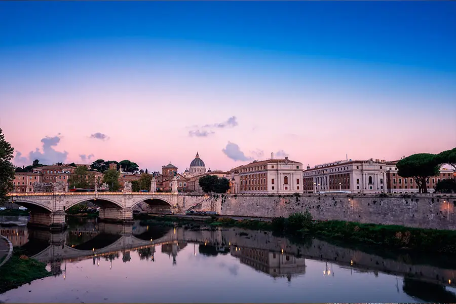 Bridge over the River Tiber in Rome at dusk